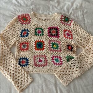 Holey patterned sweater